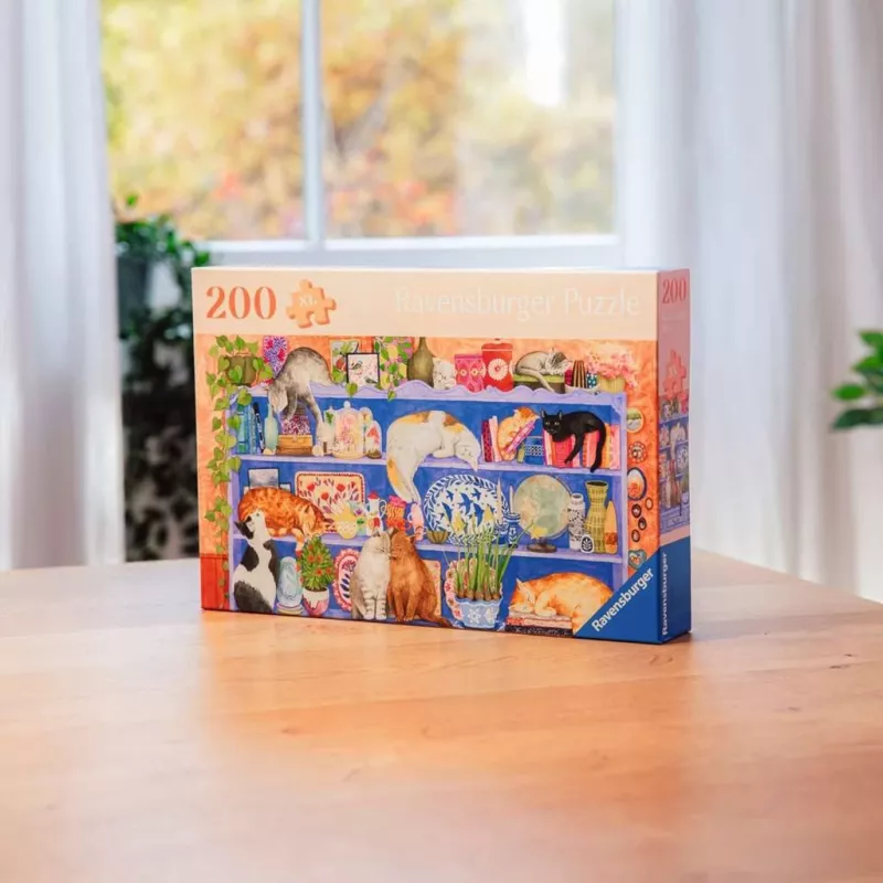 Παζλ Ravensburger Feel Well & Puzzle Cats on the Shelf – 200 τεμάχια