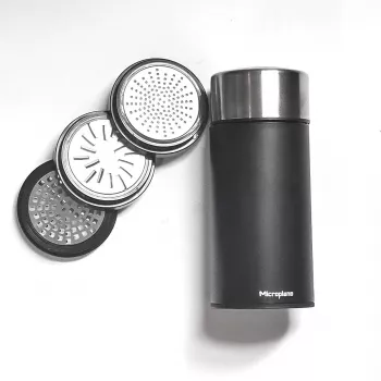 Microplane Universal Mill - μαύρο/διαφανές, περιστροφικός τρίφτης για σκληρό τυρί, σοκολάτα, ξηρούς καρπούς, μπαχαρικά